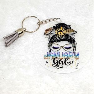 7/$10 January Girl Acrylic Keychain with Tassel, New